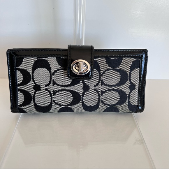 Coach Handbags - Coach Parker Signature Skinny Turn Lock Wallet